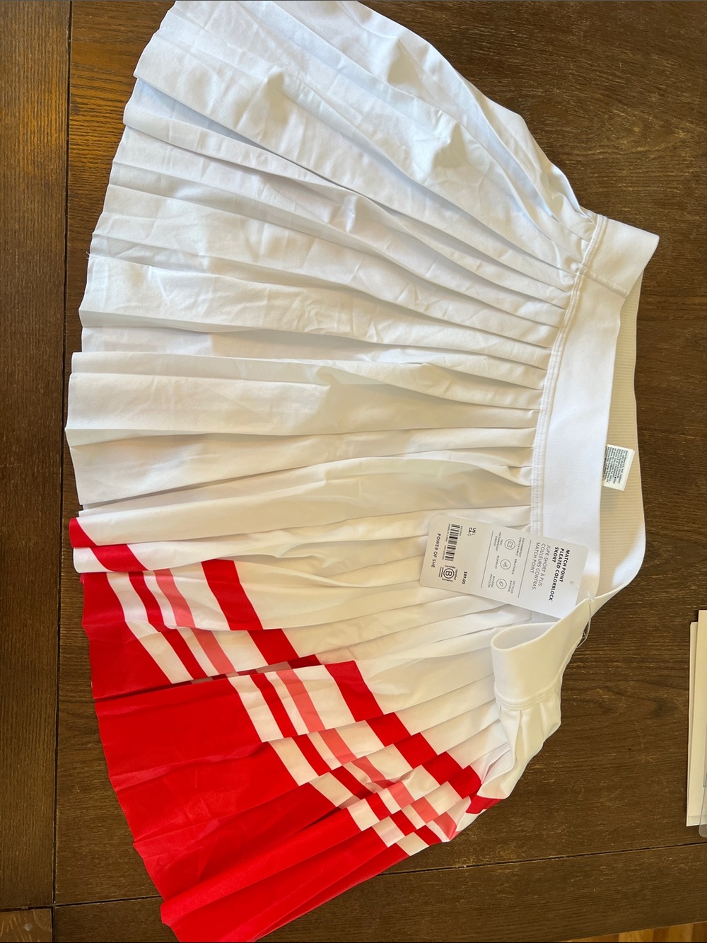 NWT Athleta White Pleated Mini Skirt with Red Stripe Accents